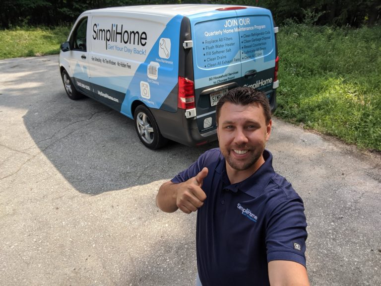 owner of simplihome behind work van with thumbs up