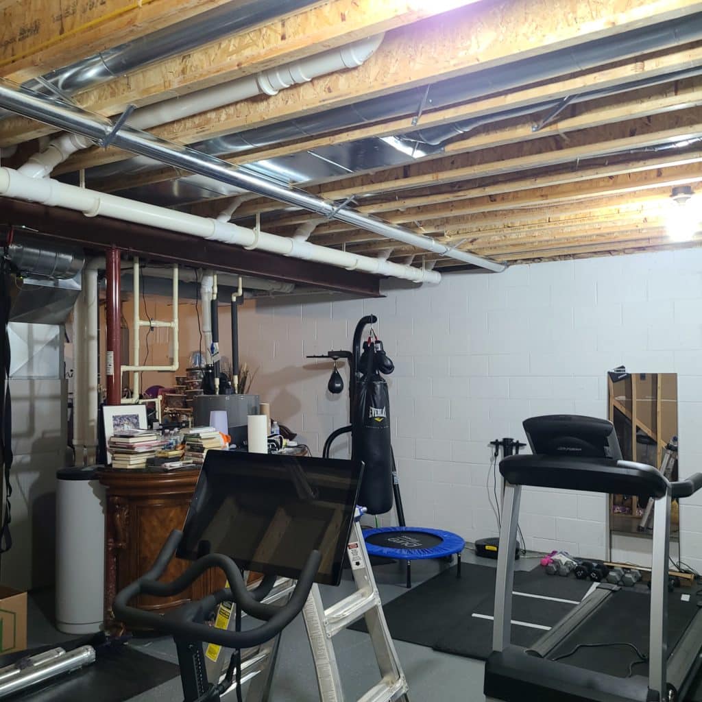 dryer vent ducting running along basement ceiling