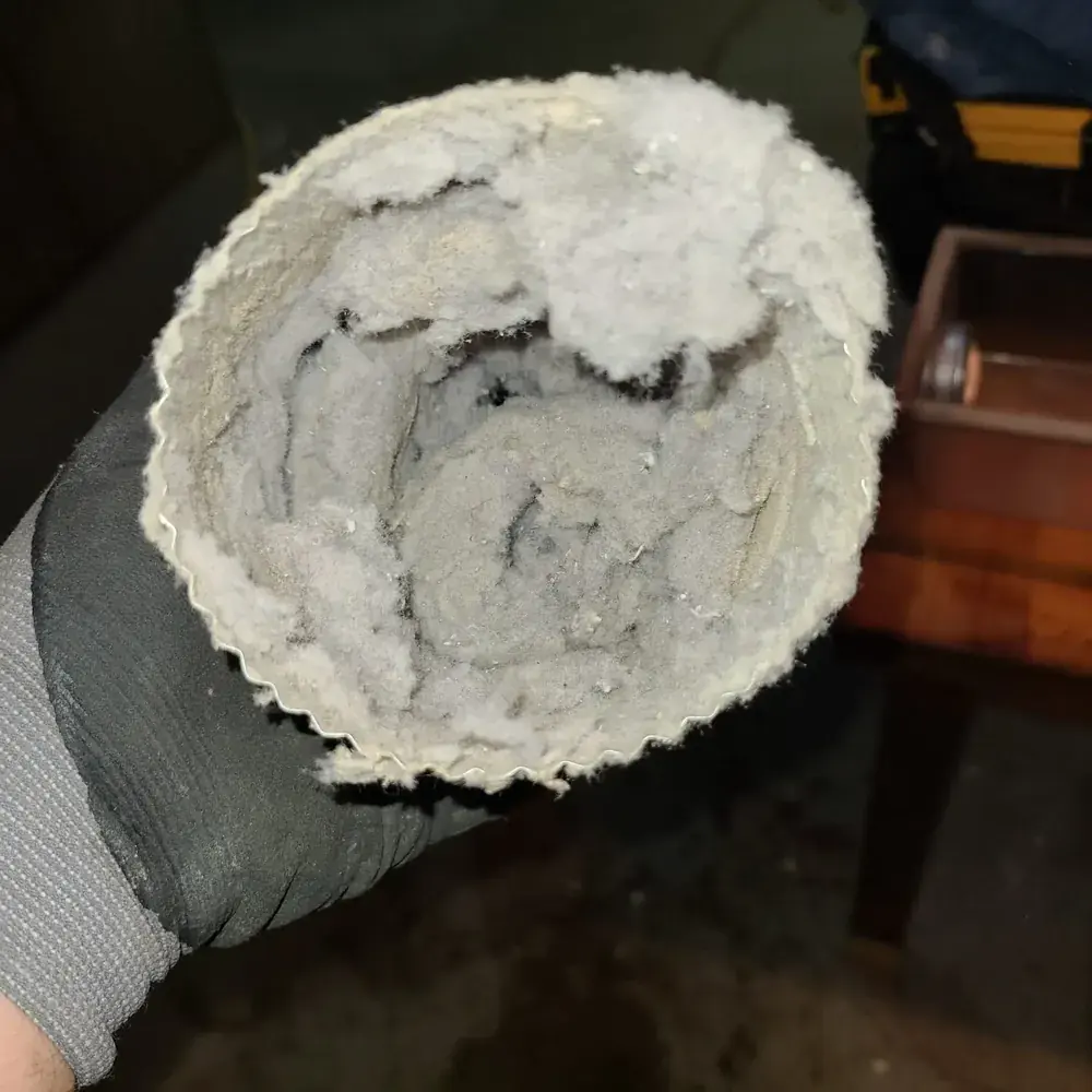 Lint clogged in flex ducting of a dryer vent in Wisconsin